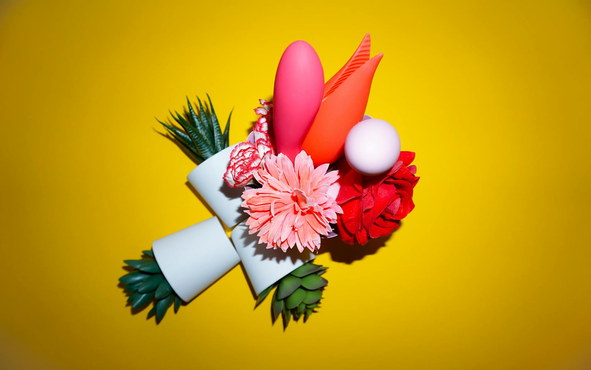 Colorful arrangement of flowers and abstract objects representing pleasure and vitality after emotional difficulty